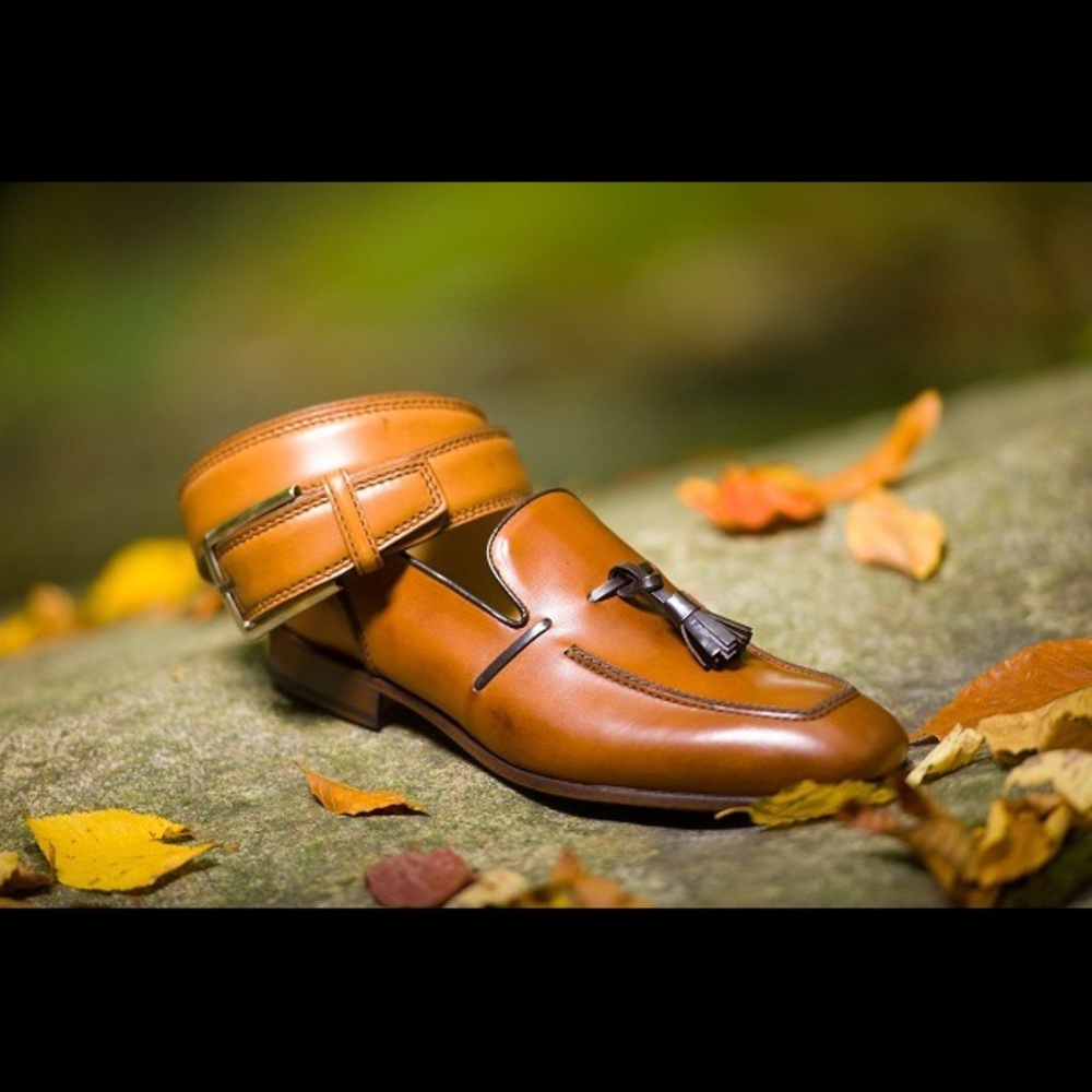 Brown leather slip ons